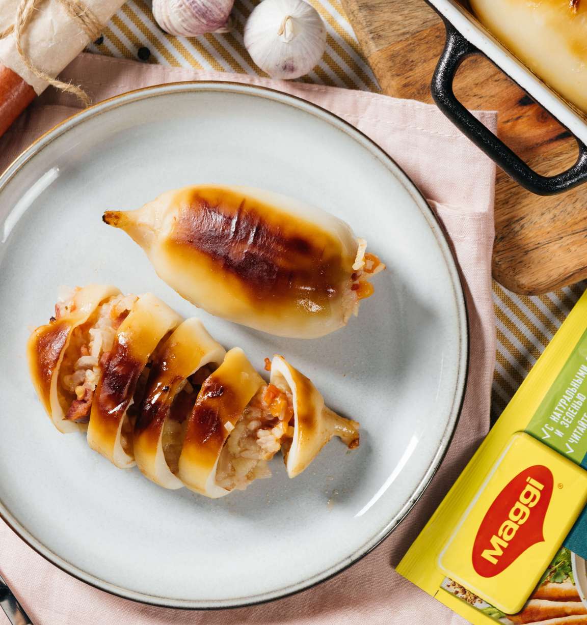 Кальмары, фаршированные рисом и острыми колбасками - рецепт от Магги